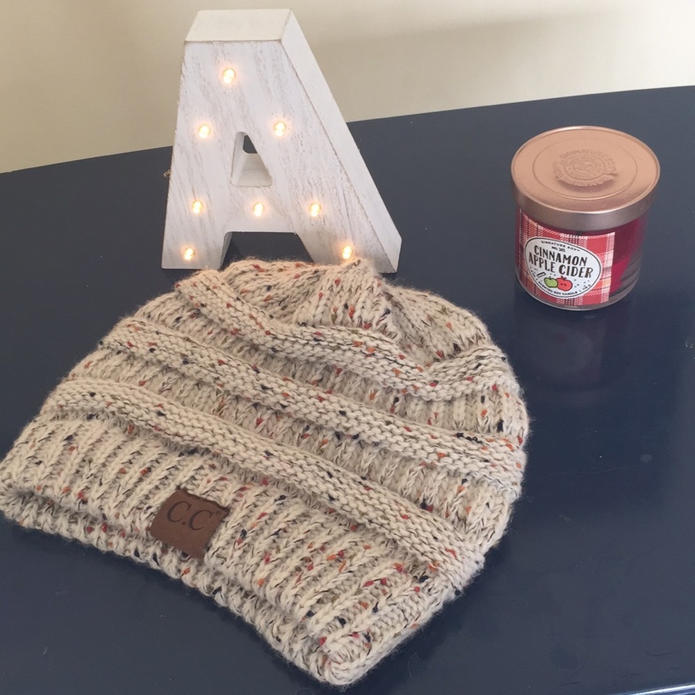 C.C beige beanie with multicolored specs!!